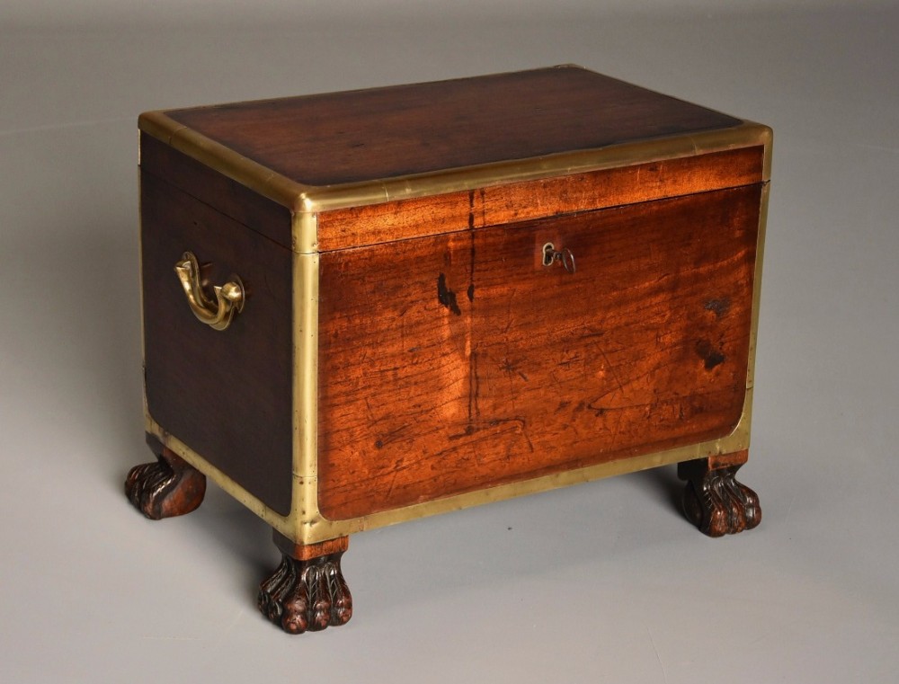 Mid 19thc teak and brass bound Campaign cellarette of superb patina