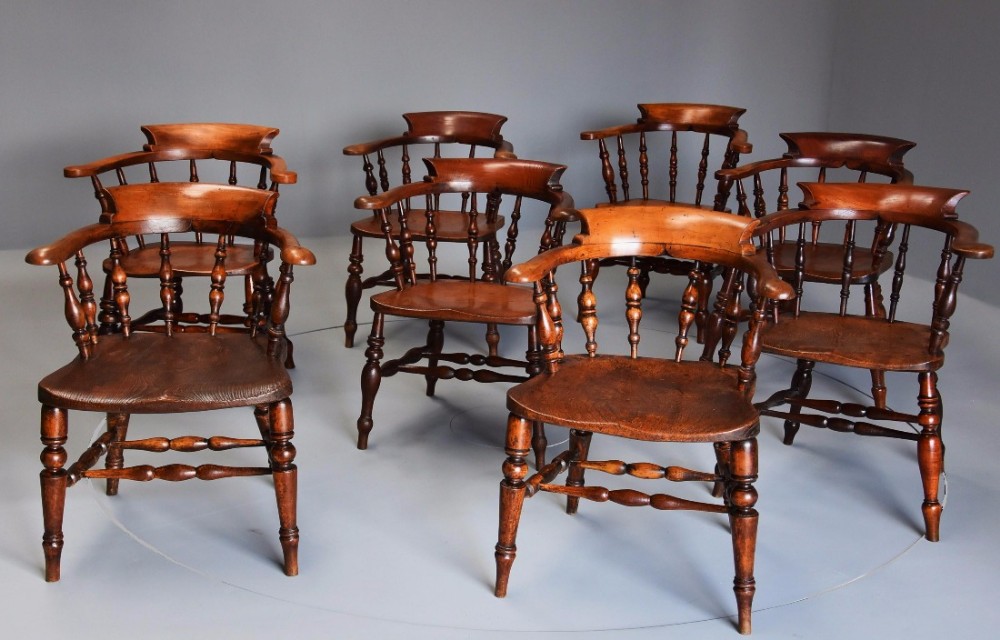 Large matched set of eight mid 19thc Smokers bow chairs or Office chairs