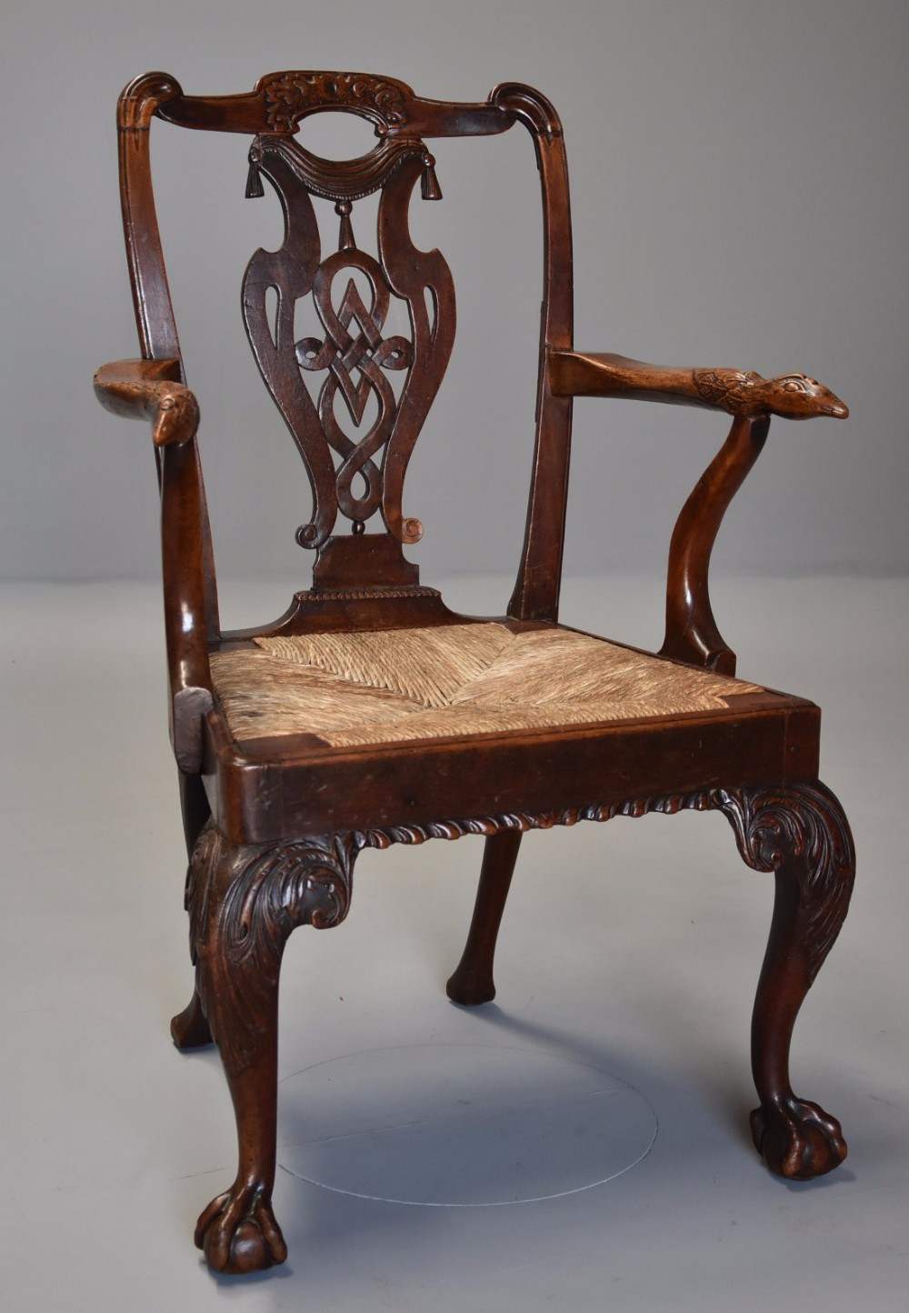 18th century mahogany and walnut armchair of sophisticated design and excellent patina