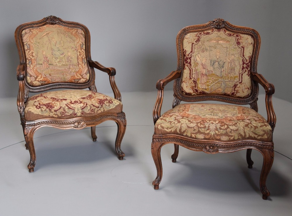 Pair of 19th century French fauteuils of large proportion with original needlework