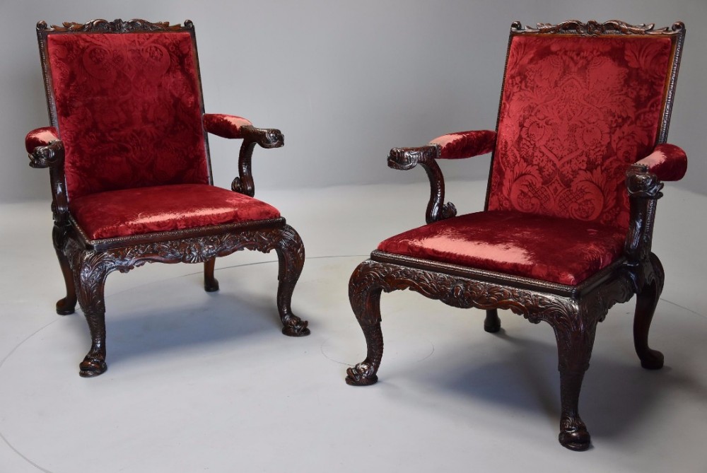 Exceptional pair of late 19th century George II style mahogany Gainsborough open armchairs