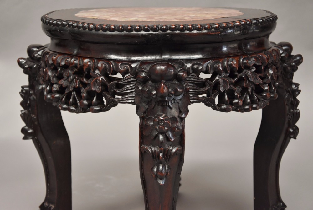 Pair of late 19th century Chinese hardwood circular pot stands or low tables View VII