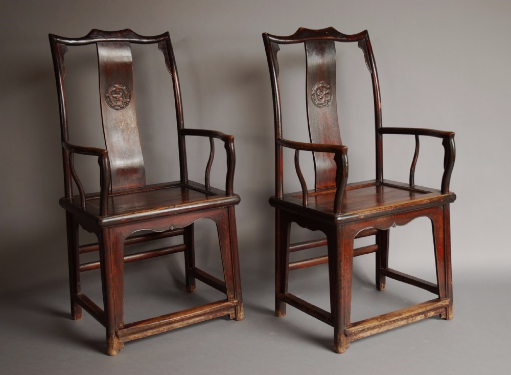 Pair of late 19th century Chinese yoke back elm armchairs of good patina