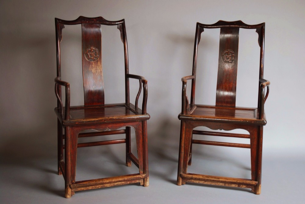Pair of late 19th century Chinese yoke back elm armchairs of good patina View II