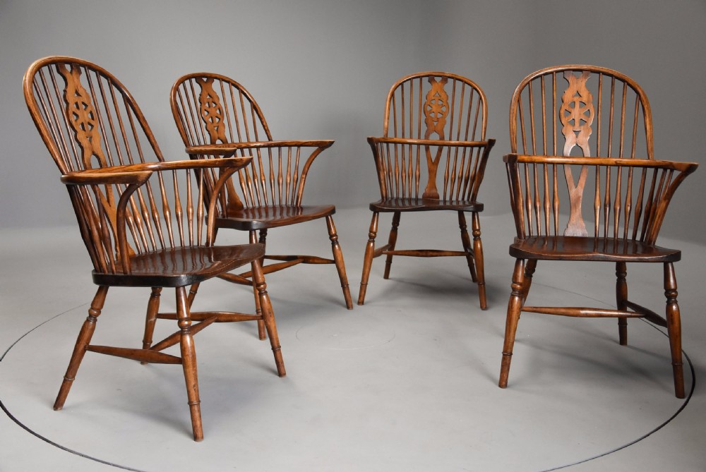 Set of four early 20th century ash and elm wheelback Windsor armchairs View II