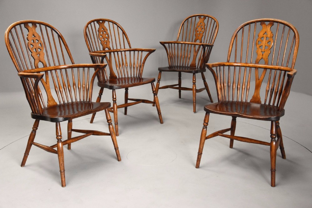 Set of four early 20th century ash and elm wheelback Windsor armchairs View III