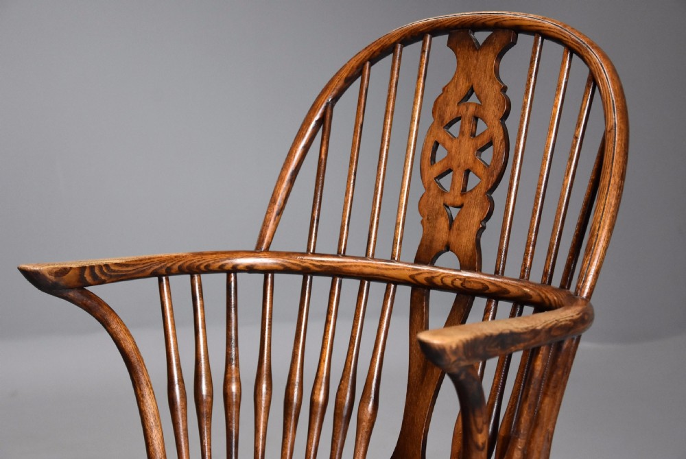 Set of four early 20th century ash and elm wheelback Windsor armchairs View VIII