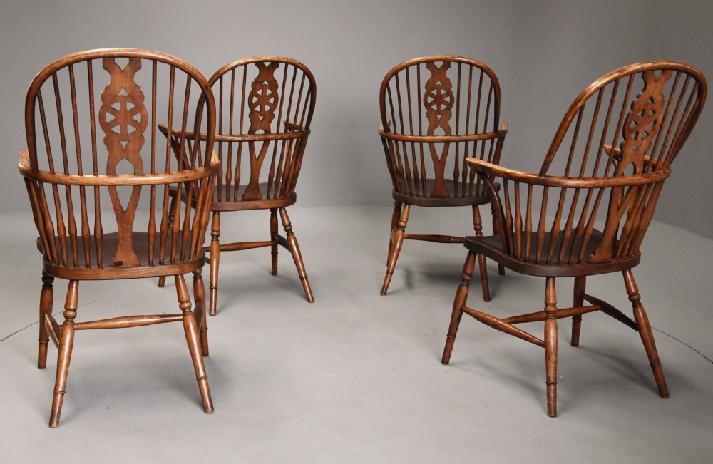 Set of four early 20th century ash and elm wheelback Windsor armchairs View XIII