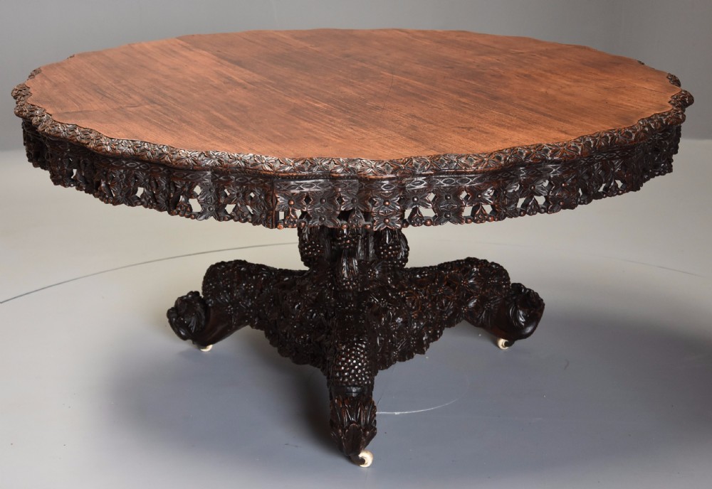 Large highly decorative 19th century Anglo Indian padouk centre table of circular form View III