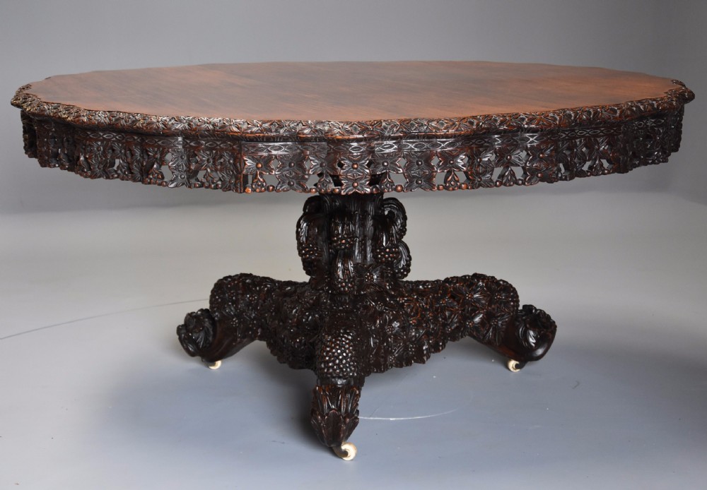 Large highly decorative 19th century Anglo Indian padouk centre table of circular form View IV