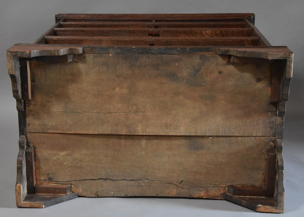 Early 18th century oak and elm moulded front chest of drawers of good patina View XIV