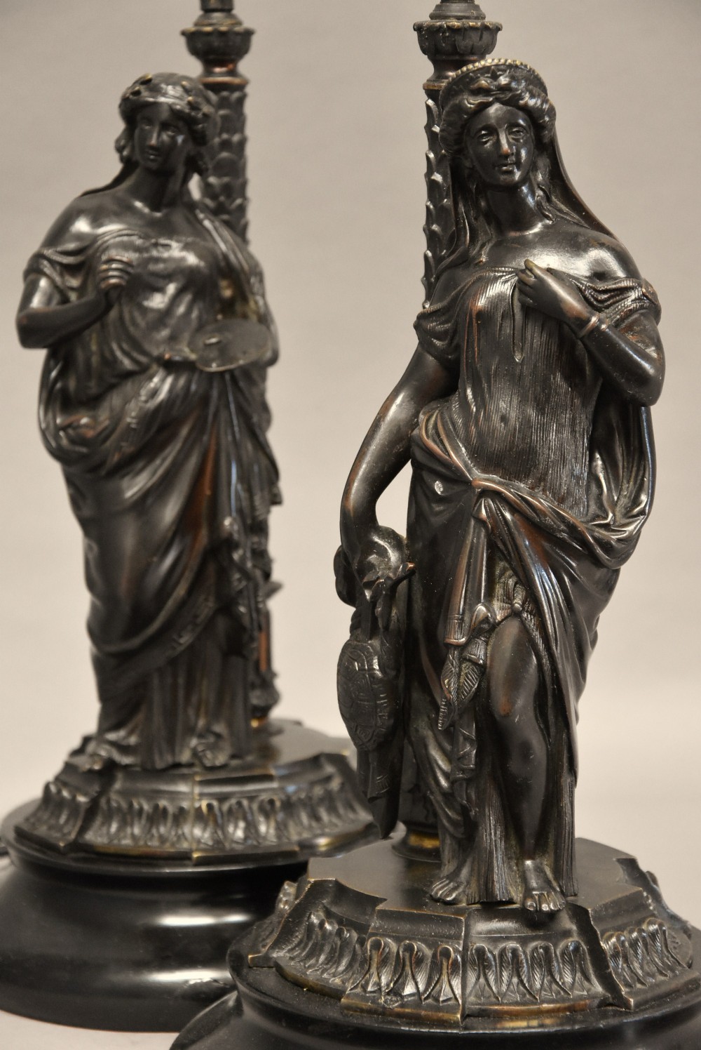 Decorative pair of late 19thc bronze table lamps in the form of Classical Grecian figures