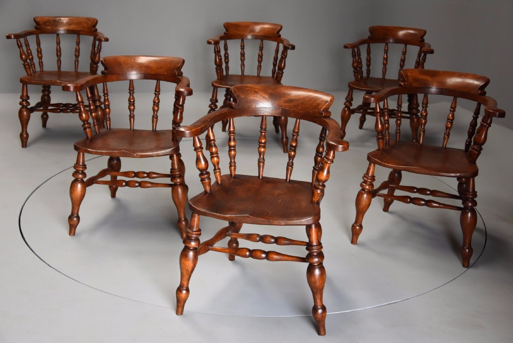 Superb set of six mid 19th century nicely figured elm Smokers bow Windsor chairs