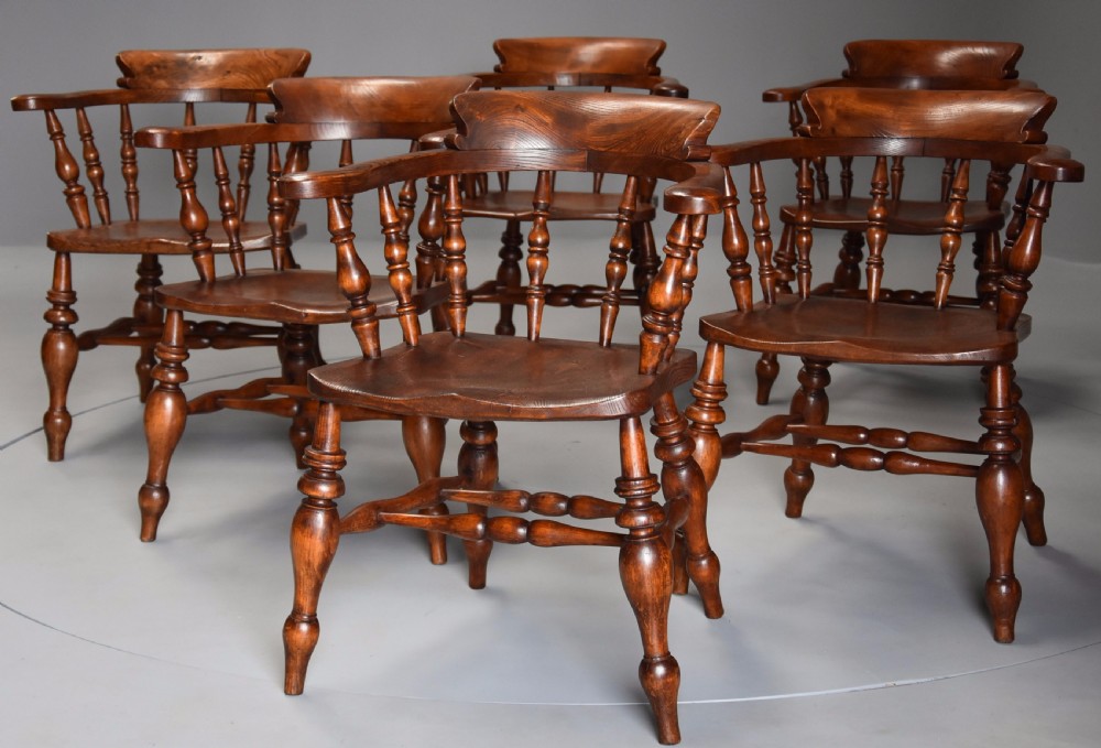 Superb set of six mid 19th century nicely figured elm Smokers bow Windsor chairs View IV