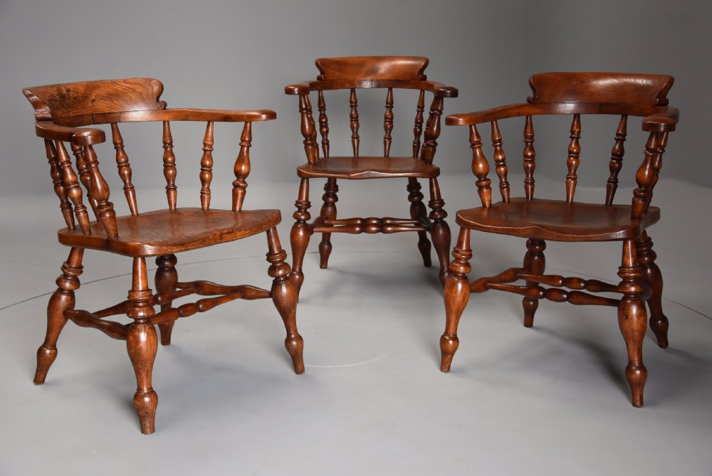 Superb set of six mid 19th century nicely figured elm Smokers bow Windsor chairs View V