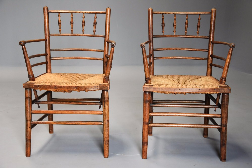 Pair of late 19th century ash & beech Morris & Co. Sussex armchairs  View II