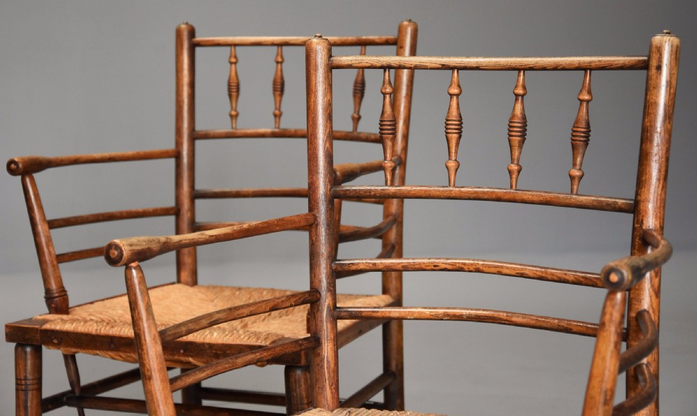 Pair of late 19th century ash & beech Morris & Co. Sussex armchairs  View III