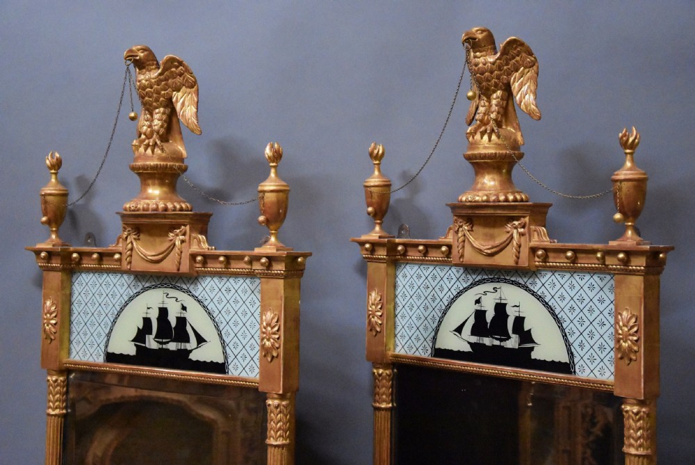 Superb pair of early 20th century carved giltwood pier mirrors in the Regency style View III