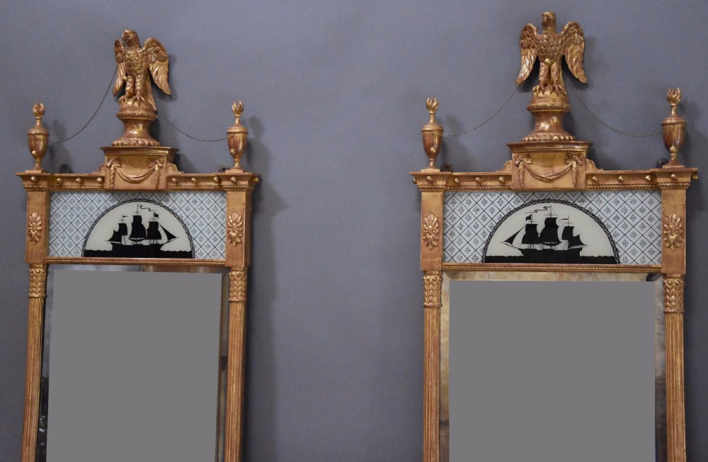 Superb pair of early 20th century carved giltwood pier mirrors in the Regency style View IV