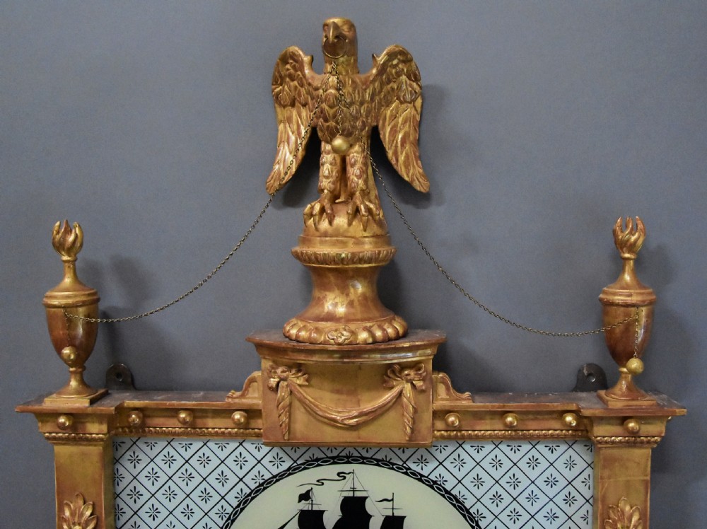 Superb pair of early 20th century carved giltwood pier mirrors in the Regency style View VI