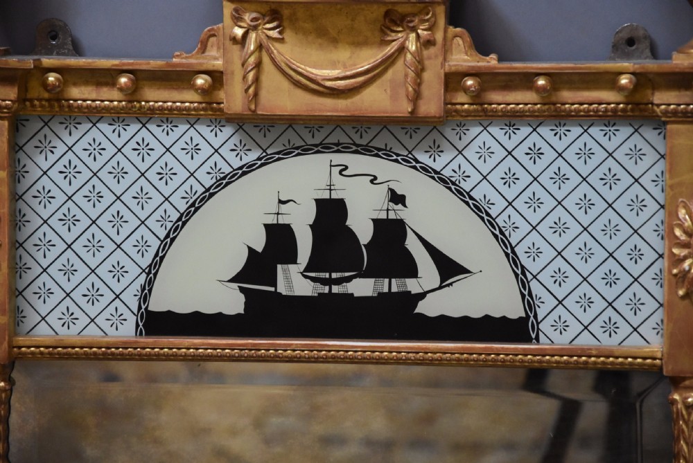 Superb pair of early 20th century carved giltwood pier mirrors in the Regency style View IX