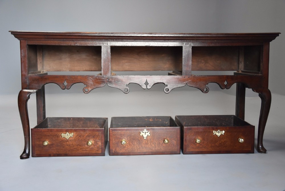 Mid 18th century oak cabriole leg dresser base of rich patina View IV