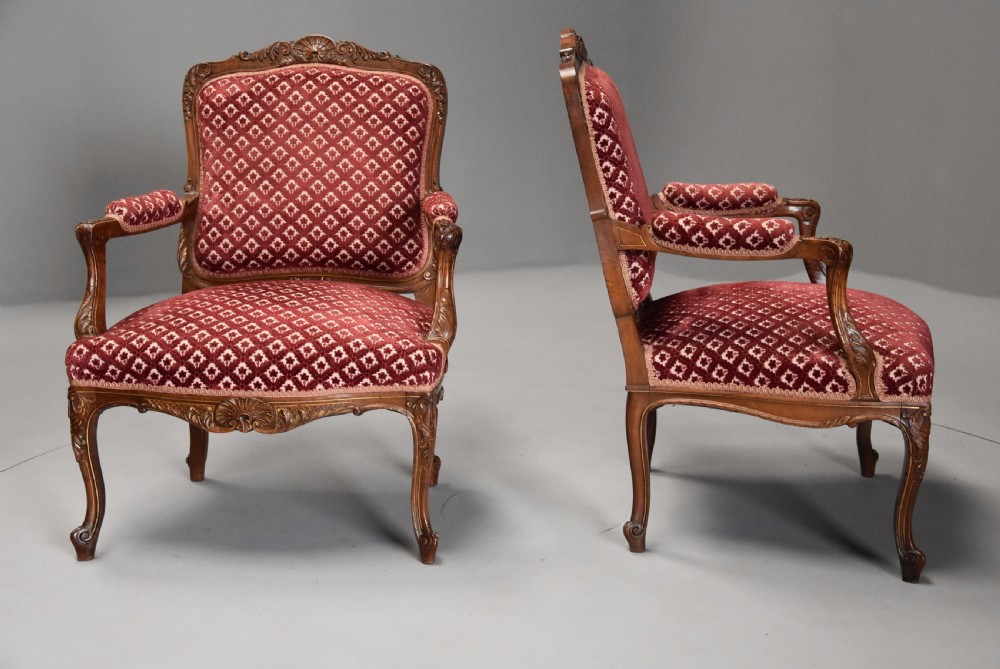 Pair of late 19thc French walnut fauteuils in the Louis XV style with traces of original gilt View V
