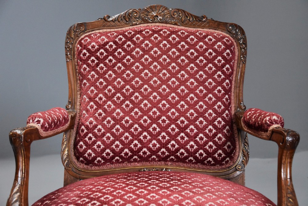 Pair of late 19thc French walnut fauteuils in the Louis XV style with traces of original gilt View VII