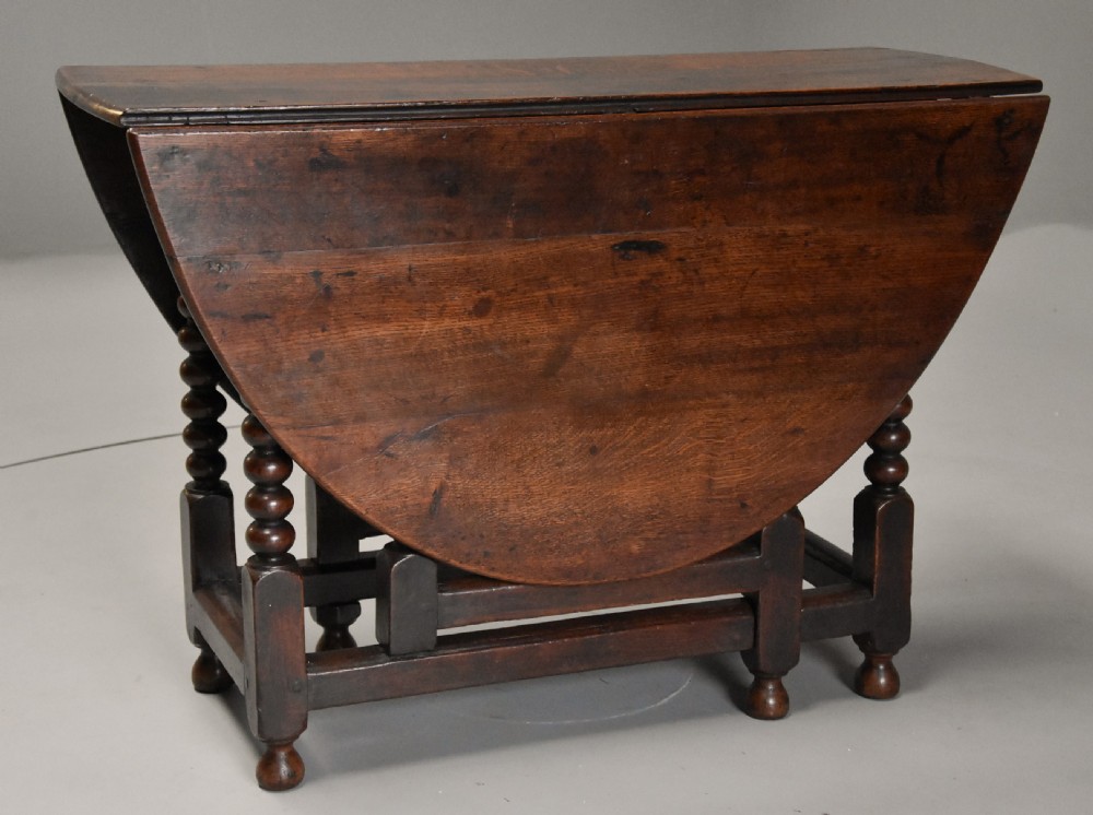 17th century oval oak gateleg table with single gate & bobbin turned legs and super patina View VIII