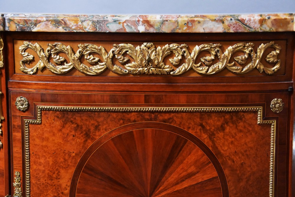 Superb quality early 20thc French Kingwood commode (or cabinet) of bow form with finely figured marble top View V