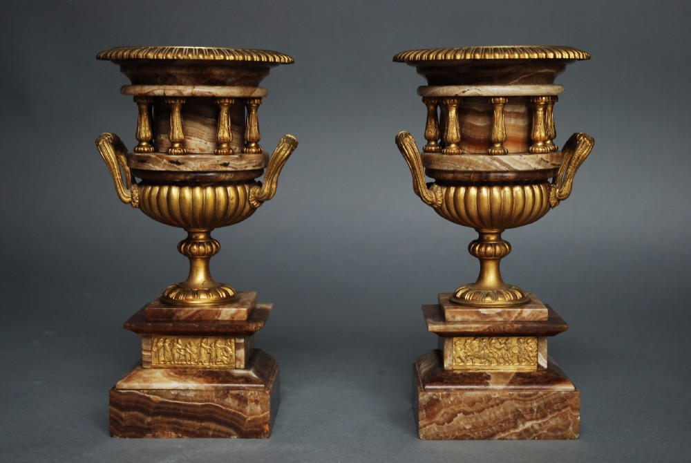 Pair of French late 19thc fine quality onyx urns with ormolu mounts in the Classical style View II