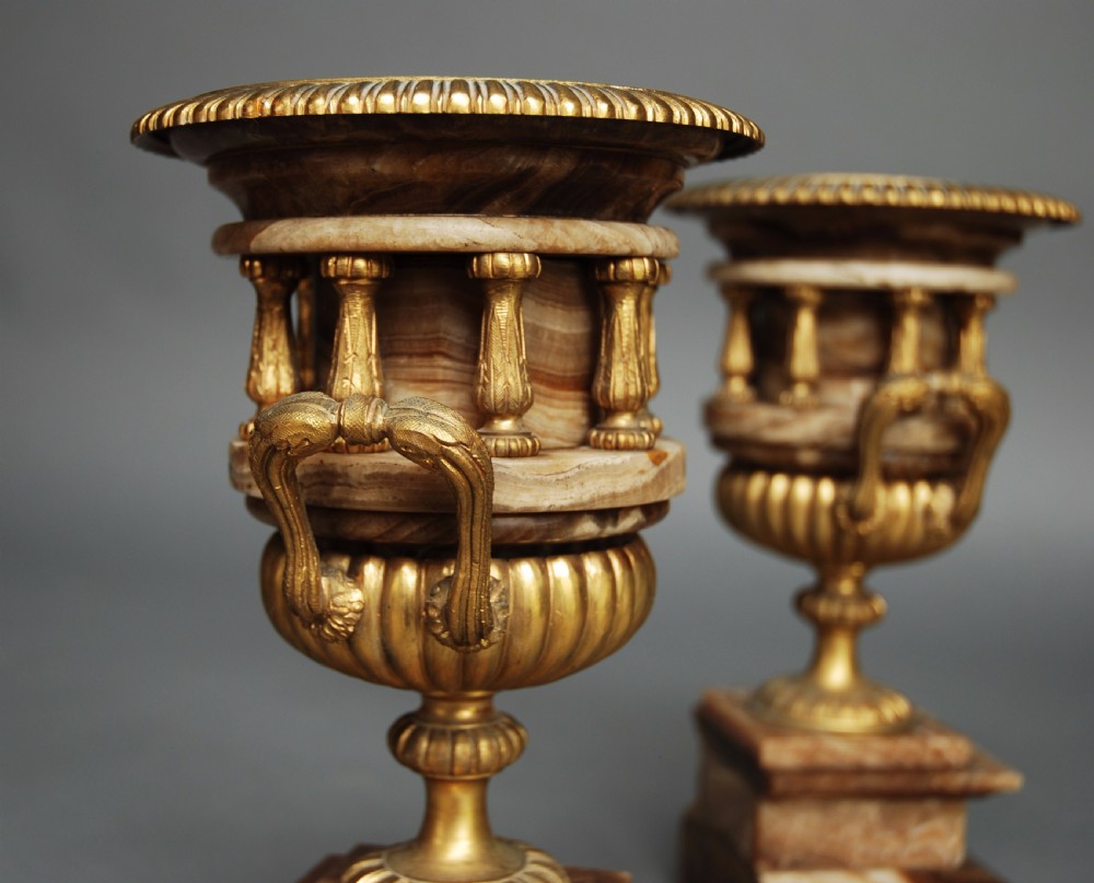 Pair of French late 19thc fine quality onyx urns with ormolu mounts in the Classical style View IV