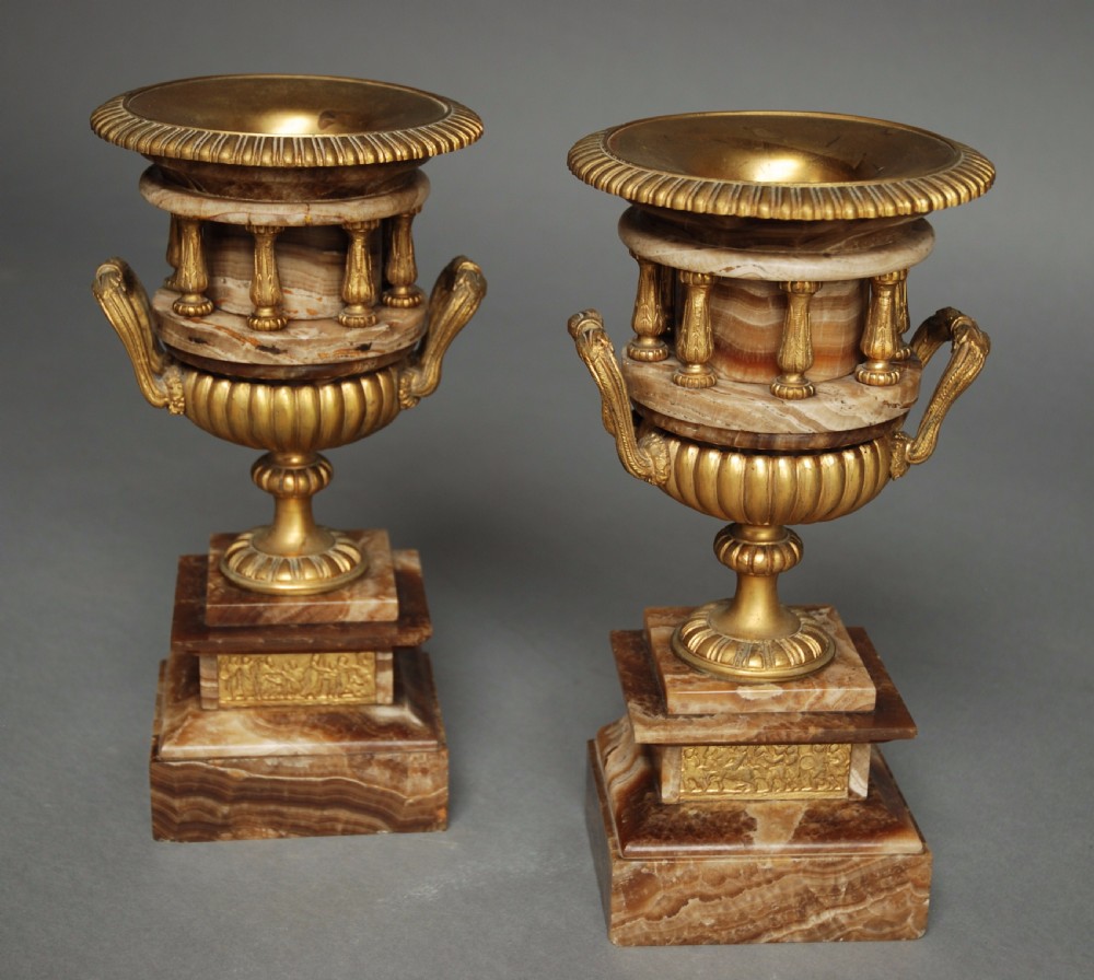 Pair of French late 19thc fine quality onyx urns with ormolu mounts in the Classical style View V
