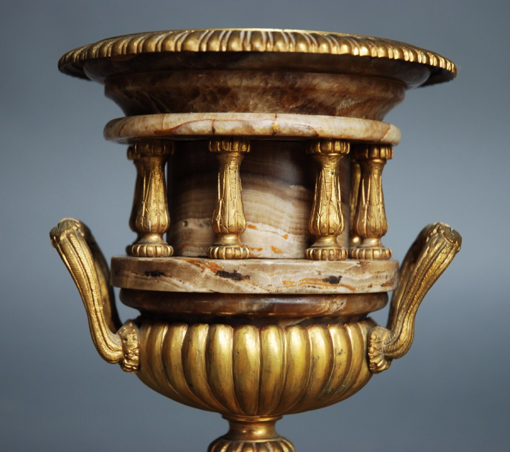 Pair of French late 19thc fine quality onyx urns with ormolu mounts in the Classical style View VIII