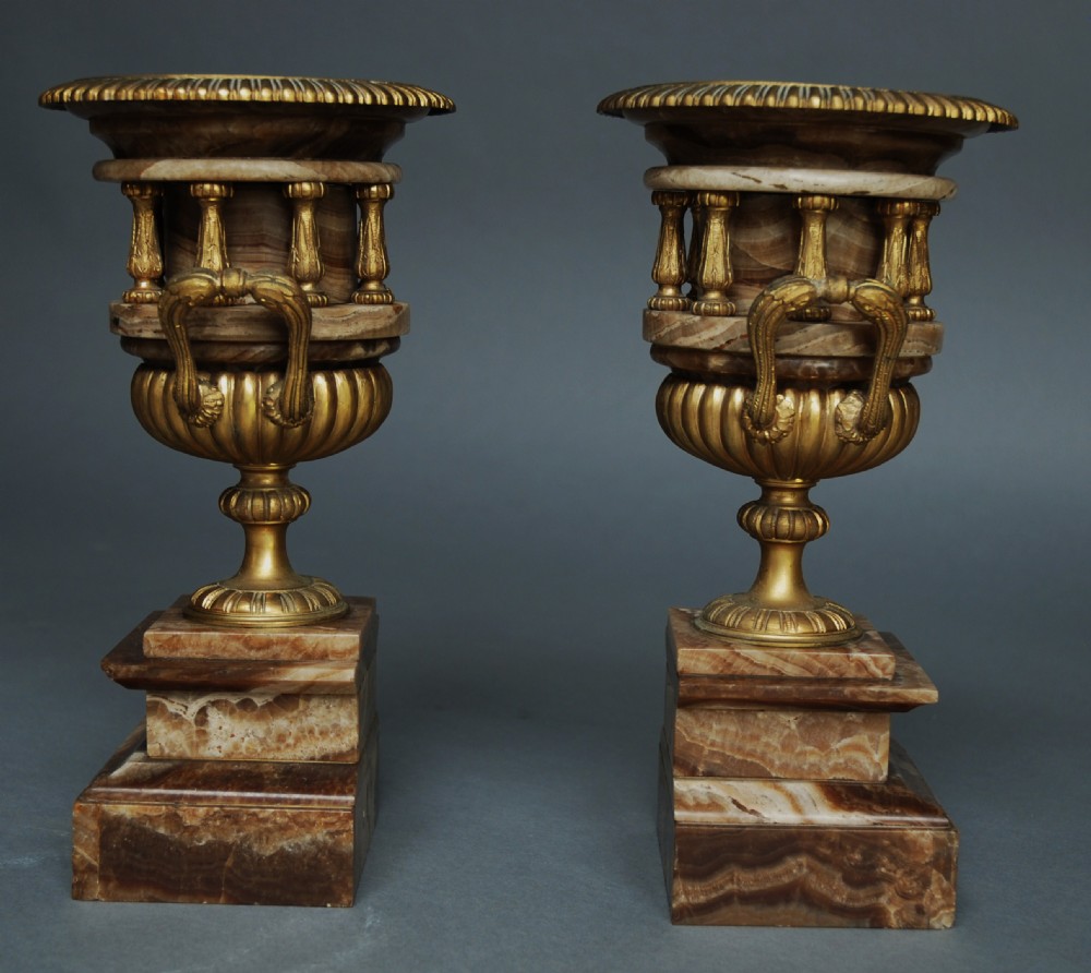 Pair of French late 19thc fine quality onyx urns with ormolu mounts in the Classical style View XII