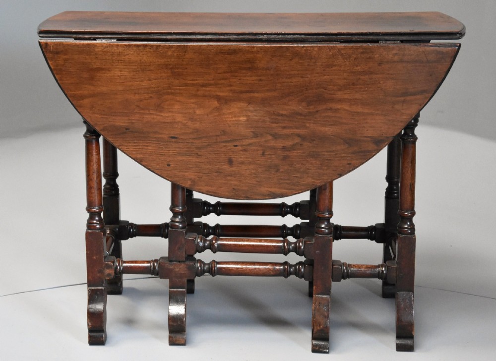 Rare 18th century mahogany gateleg table of small proportions & good patina View VII
