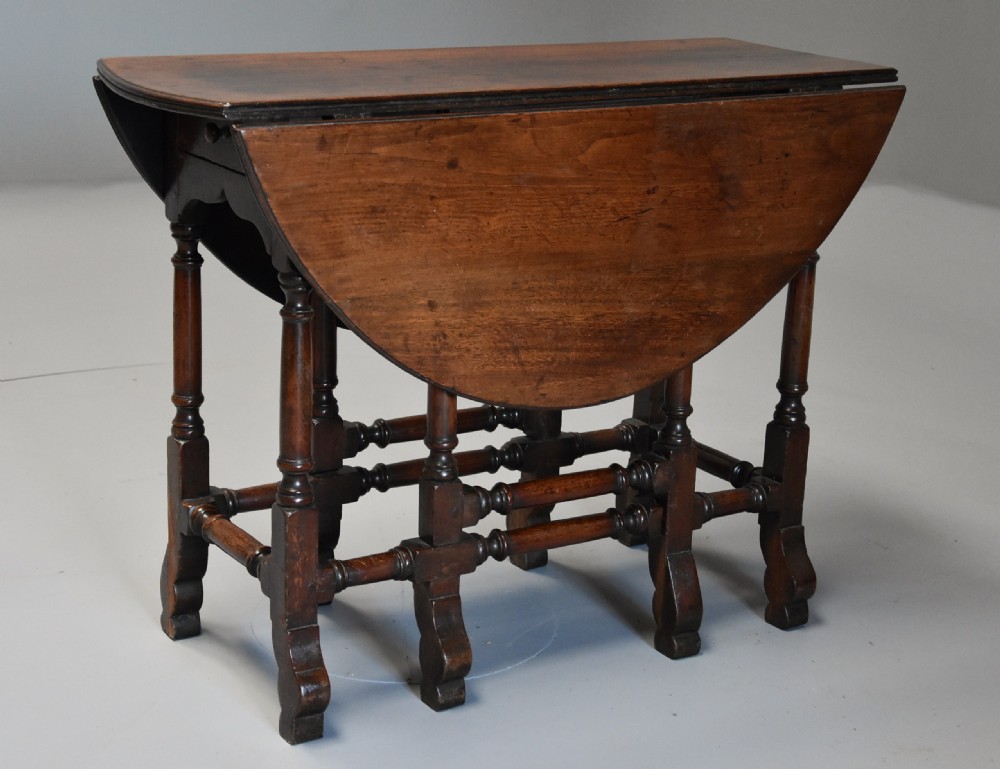 Rare 18th century mahogany gateleg table of small proportions & good patina View IX