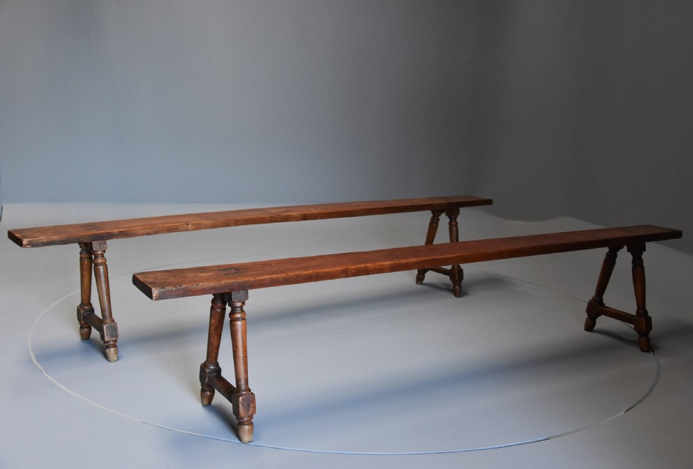 Pair of mid 19th century French fruitwood (cherry) benches of superb patina View II