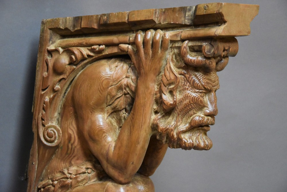 Large highly decorative superbly carved Continental pine bracket in the form of a satyr View IV