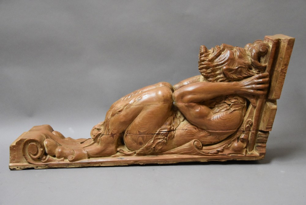 Large highly decorative superbly carved Continental pine bracket in the form of a satyr View IX