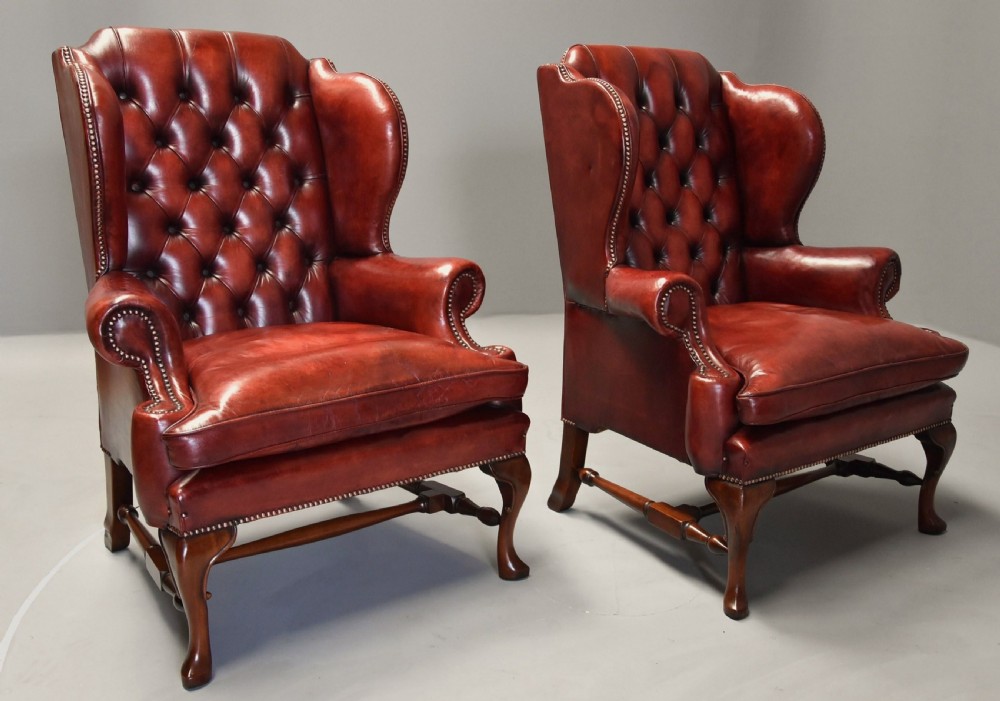 Superb pair of early 20th century Georgian style deep buttoned red leather wing armchairs View II