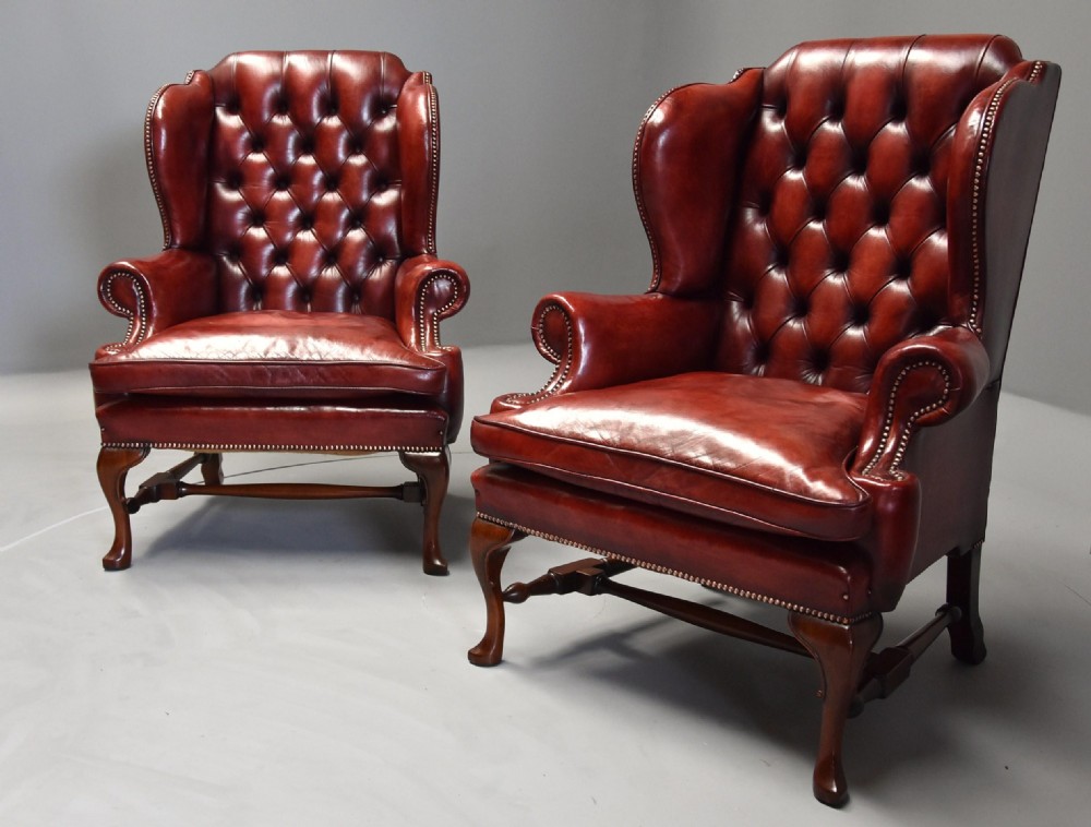 Superb pair of early 20th century Georgian style deep buttoned red leather wing armchairs View III