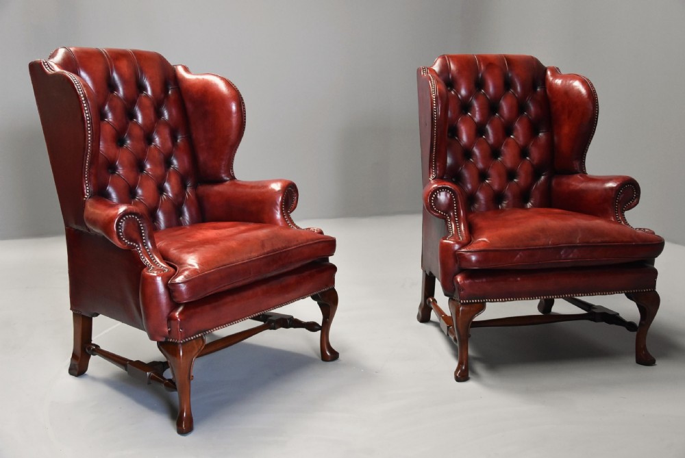 Superb pair of early 20th century Georgian style deep buttoned red leather wing armchairs View VII