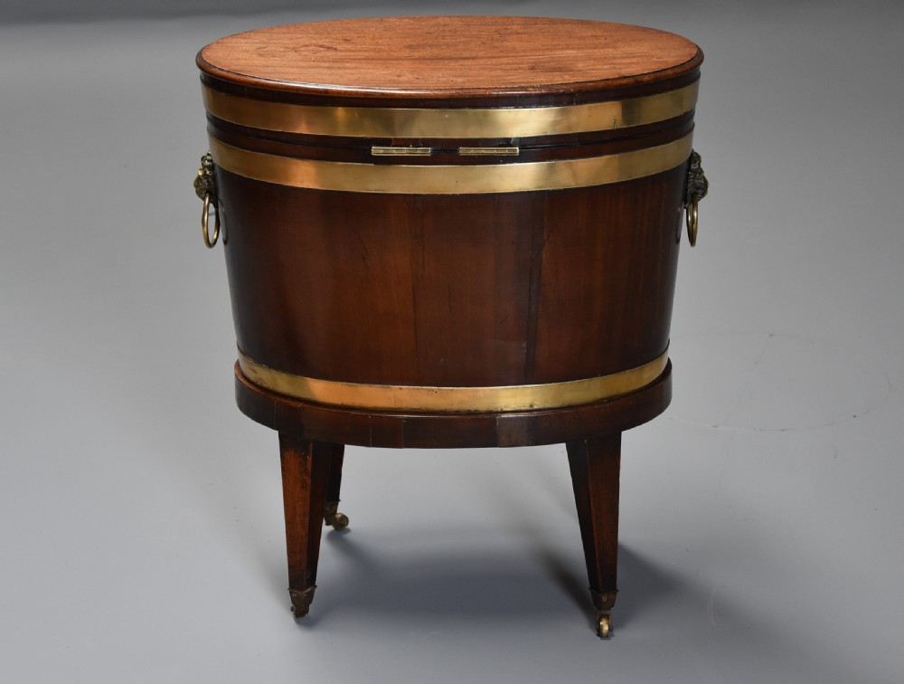 Late 18th century mahogany & brass bound oval cellaret of slender proportion View IX
