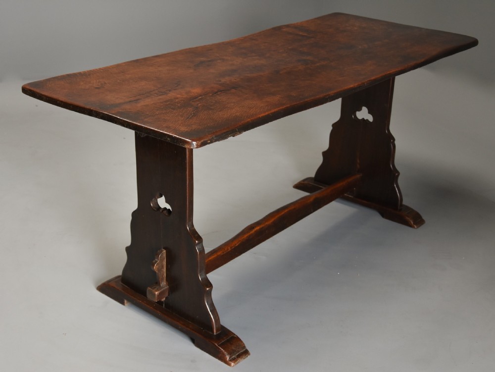 Early 20th century Arts & Crafts oak pegged trestle table with superb patina