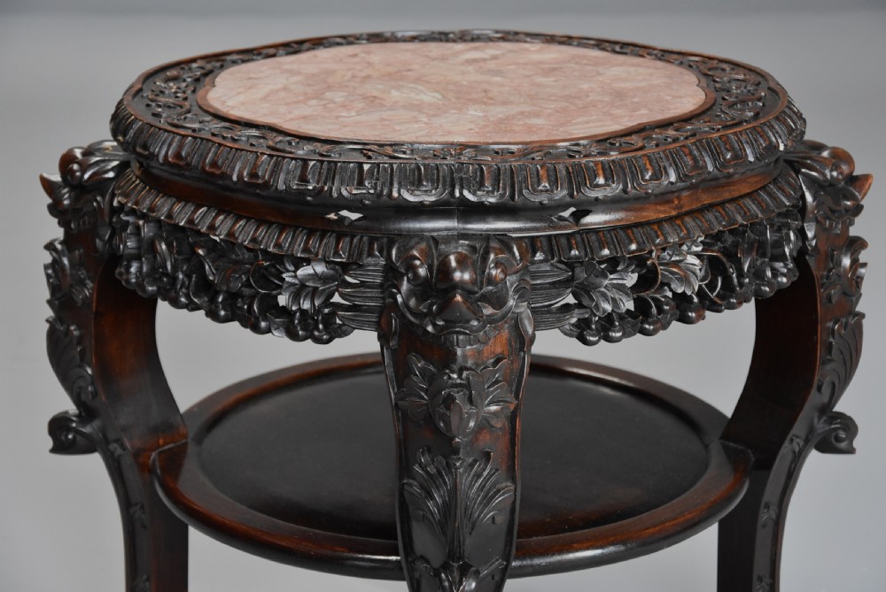 Late 19th century Chinese hardwood circular pot stand or low table  View III