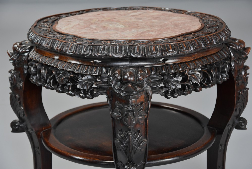 Late 19th century Chinese hardwood circular pot stand or low table  View IV