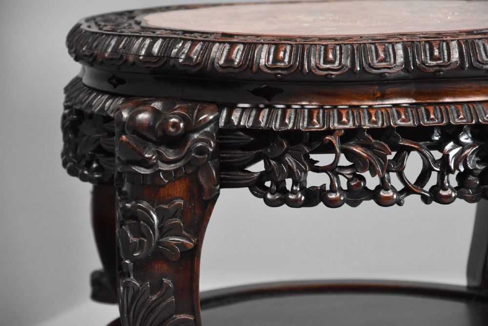 Late 19th century Chinese hardwood circular pot stand or low table  View VI