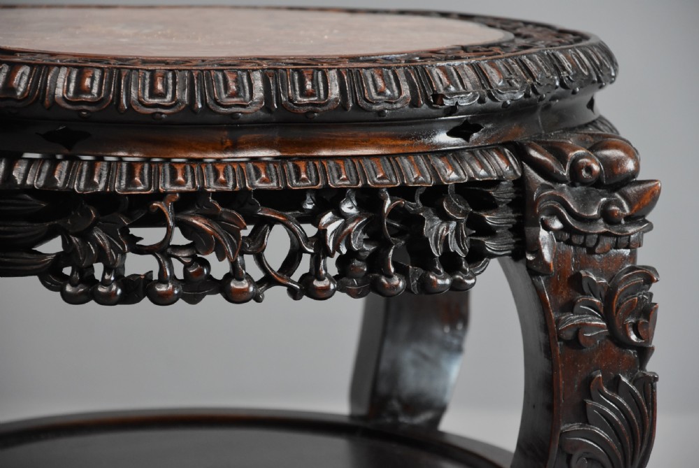 Late 19th century Chinese hardwood circular pot stand or low table  View VII