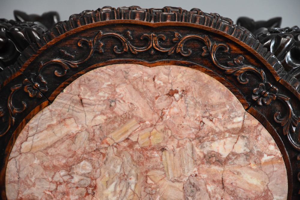 Late 19th century Chinese hardwood circular pot stand or low table  View VIII